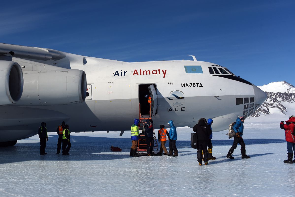 10B Leaving The Air Almaty Ilyushin Airplane And Stepping Onto The Slippery Hard Blue Ice Of Union Glacier In Antarctica On The Way To Climb Mount Vinson